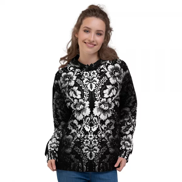 Stylischer Damen Designer Hoodie - Ein schwarzer Damenhoodie des Designer Labels ANTONY YORCK mit einem auffälligen weißen floralen Muster im baroque Noir Stil, das den gesamten Stoff bedeckt. Der Hoodie zeigt den Schriftzug "ANTONY YORCK" am Ärmel und hat eine Kapuze mit Kordelzug. Perfekt für luxury urban street style, streetwear fashion und subversive style. Entdecken Sie mehr auf https://antonyyorck.com. Schlüsselwörter: trendy womenswear, modern fashion, designer hoodie, urban clothing, stylish streetwear.