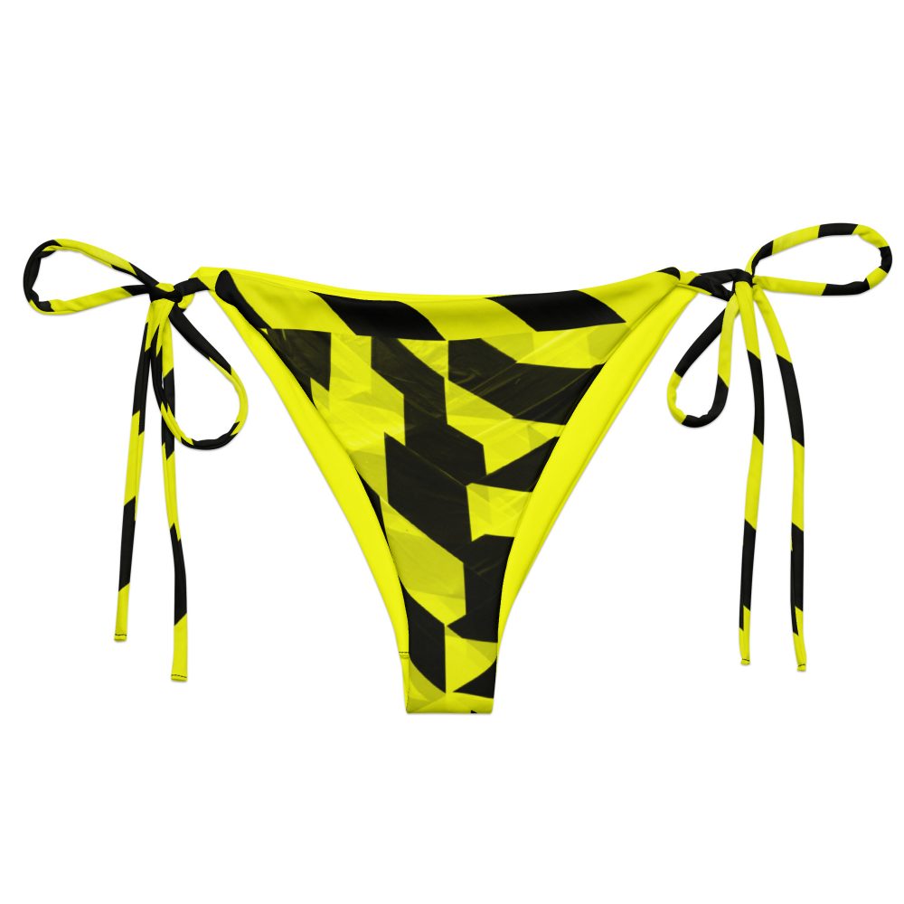 Frontansicht des PROHIBITED NOBILITY Edition 01 Bikini-Unterteils von Antony Yorck; flach liegend auf weißem Hintergrund, Fokus auf Tanga-Schnitt und den neongelb-schwarzen Print.
