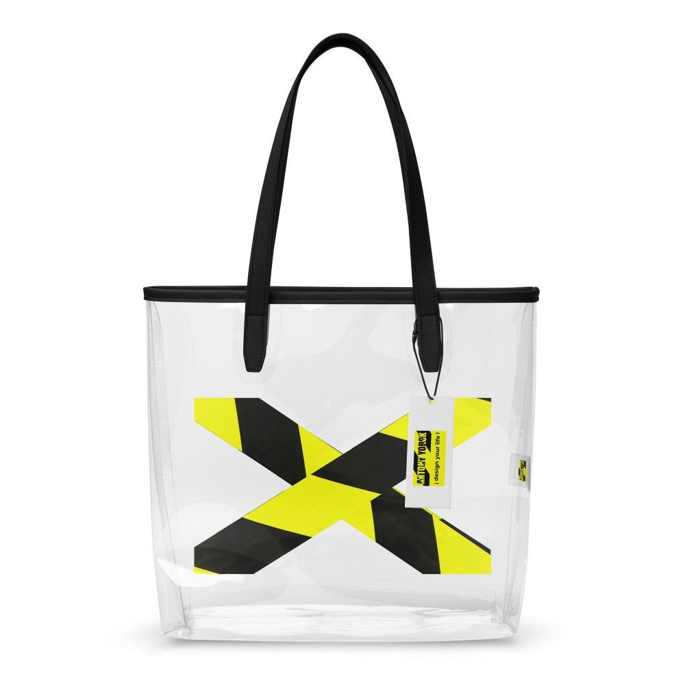 Clear Tote Bag Designer Stück der Extraklasse, die Edition 01Transparente Designer-Tragetasche von ANTONY YORCK mit markantem neongelb-schwarzem X-Print, exklusiv in Handarbeit gefertigt.